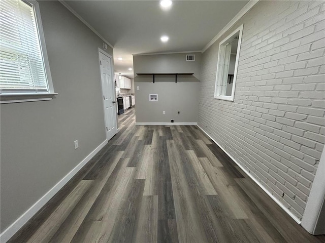 hallway with crown molding, recessed lighting, dark wood-style flooring, and baseboards