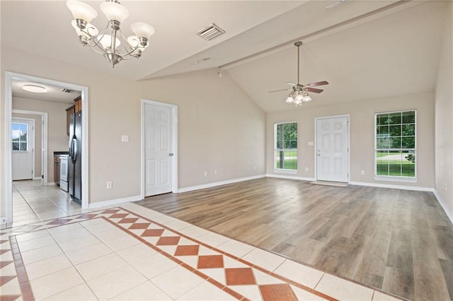 10966 Brighton Dr W, Chunchula, AL 36521 - unfurnished room with baseboards, a ceiling fan, a chandelier, and light wood-style floors