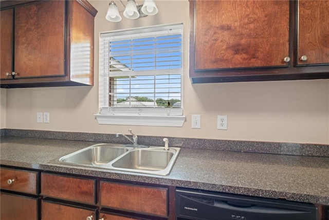 10966 Brighton Dr W, Chunchula, AL 36521 - kitchen featuring black dishwasher, dark countertops, and a sink
