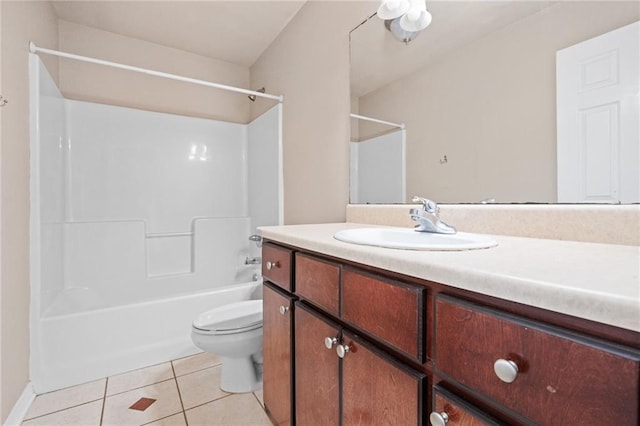 10966 Brighton Dr W, Chunchula, AL 36521 - full bathroom with tile patterned floors, vanity, toilet, and tub / shower combination