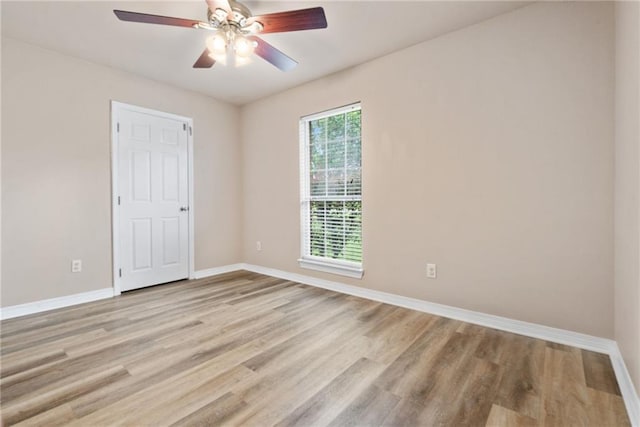 10966 Brighton Dr W, Chunchula, AL 36521 - spare room with light wood-style floors, baseboards, and a ceiling fan