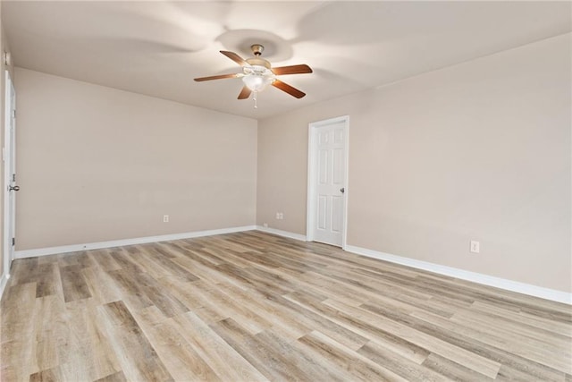10966 Brighton Dr W, Chunchula, AL 36521 - unfurnished room with a ceiling fan, light wood finished floors, and baseboards