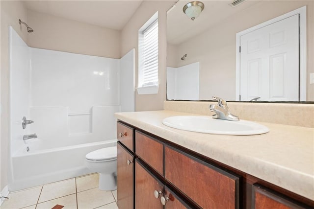 10966 Brighton Dr W, Chunchula, AL 36521 - full bathroom with vanity, toilet, shower / washtub combination, and tile patterned flooring