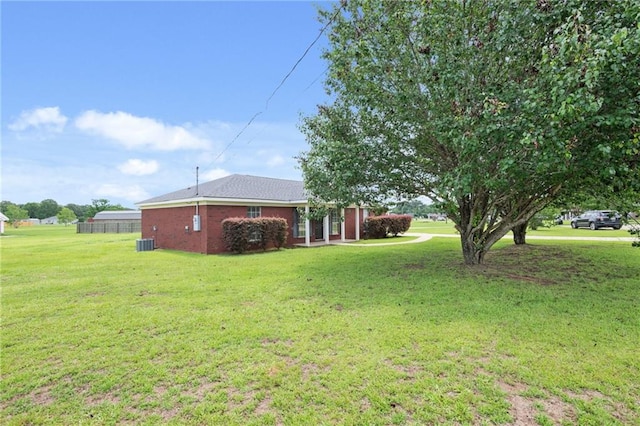 10966 Brighton Dr W, Chunchula, AL 36521 - view of grassy yard featuring cooling unit