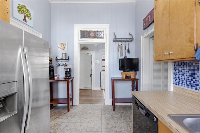 kitchen featuring stainless steel fridge, decorative backsplash, dishwasher, brown cabinets, and light countertops