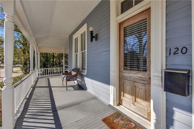 wooden deck with a porch