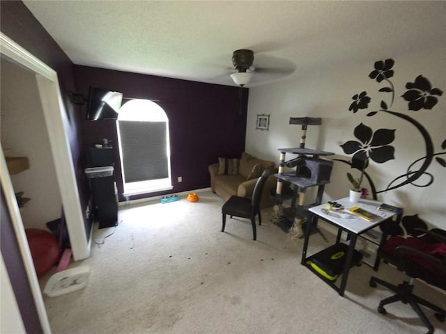 2460 Maple Dr, Mobile, AL 36695 - carpeted living area featuring ceiling fan and a textured ceiling