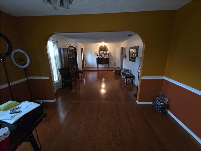 2460 Maple Dr, Mobile, AL 36695 - hall with arched walkways and wood finished floors