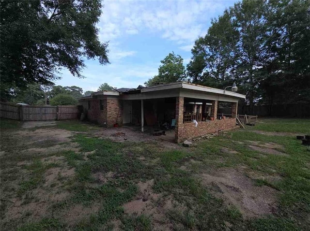 2460 Maple Dr, Mobile, AL 36695 - back of house with a fenced backyard and a patio