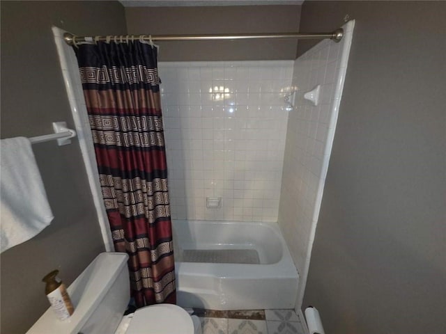 2460 Maple Dr, Mobile, AL 36695 - full bathroom featuring toilet and shower / bath combo with shower curtain