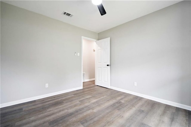 1513 Carlisle Dr W, Mobile, AL 36618 - empty room featuring ceiling fan, wood finished floors, and baseboards
