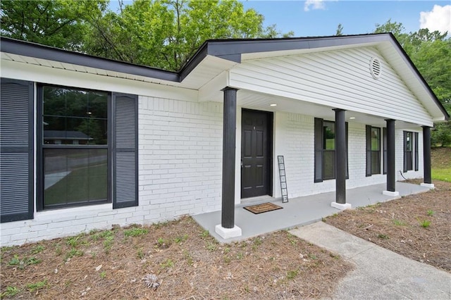 1513 Carlisle Dr W, Mobile, AL 36618 - view of front of property with covered porch and brick siding