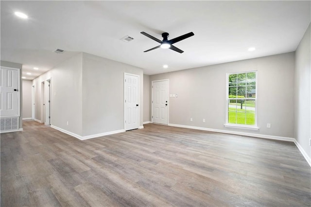 1513 Carlisle Dr W, Mobile, AL 36618 - unfurnished living room featuring ceiling fan, baseboards, recessed lighting, and wood finished floors