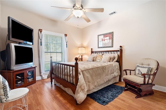 bedroom featuring ceiling fan and wood-type flooring