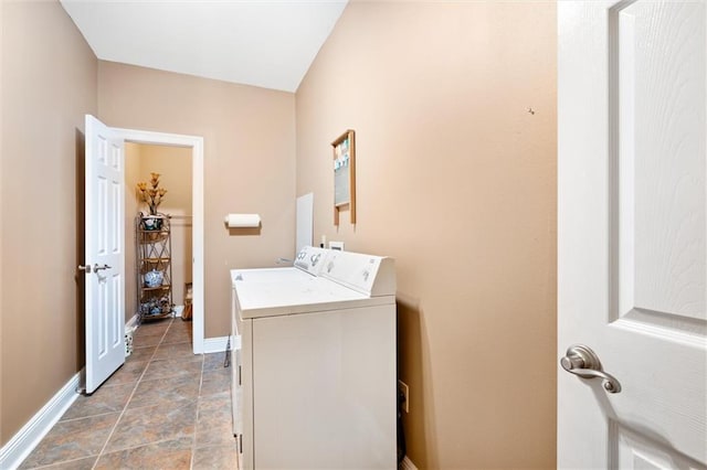 clothes washing area featuring independent washer and dryer