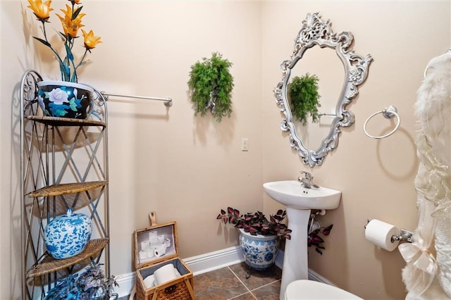 bathroom featuring tile patterned flooring and sink