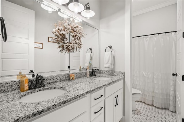 bathroom featuring toilet, ornamental molding, vanity, curtained shower, and tile patterned flooring