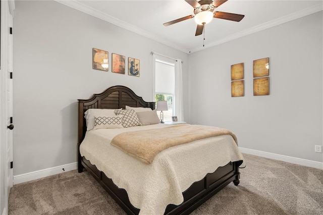 bedroom with crown molding, ceiling fan, and carpet