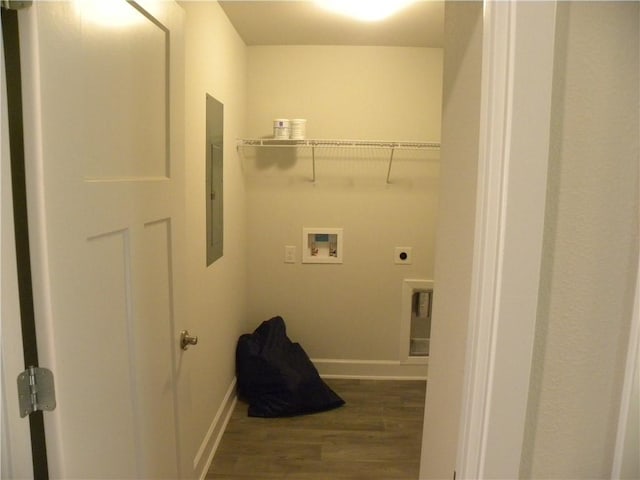 washroom with hookup for an electric dryer, dark hardwood / wood-style floors, electric panel, and hookup for a washing machine