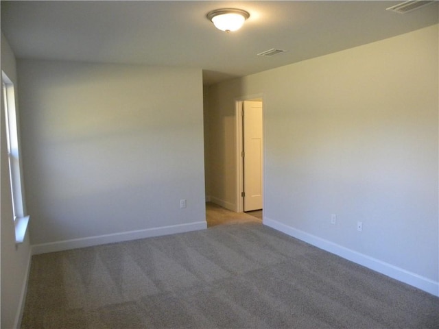 empty room with carpet floors