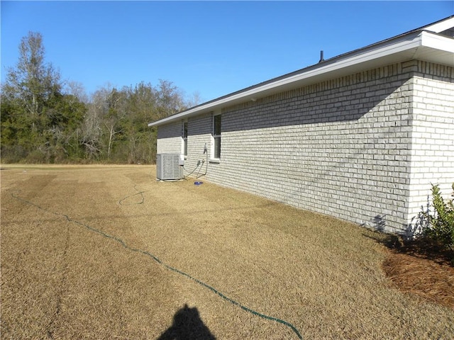 view of home's exterior featuring central AC unit