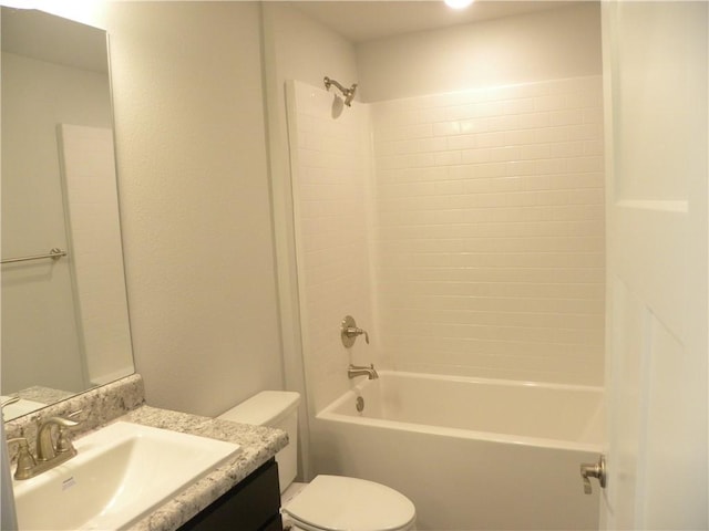 full bathroom with vanity,  shower combination, and toilet