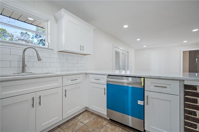 kitchen with white cabinetry, sink, wine cooler, stainless steel dishwasher, and kitchen peninsula