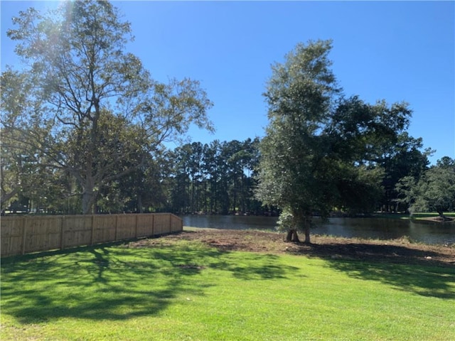 view of yard with a water view