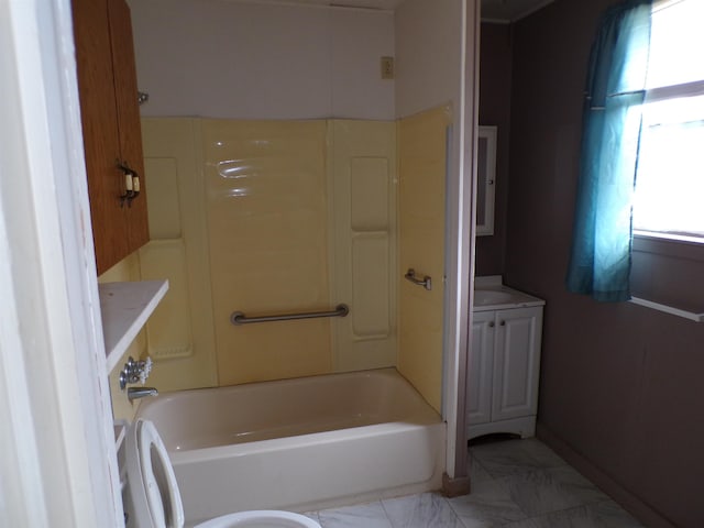 bathroom featuring marble finish floor, vanity, and baseboards