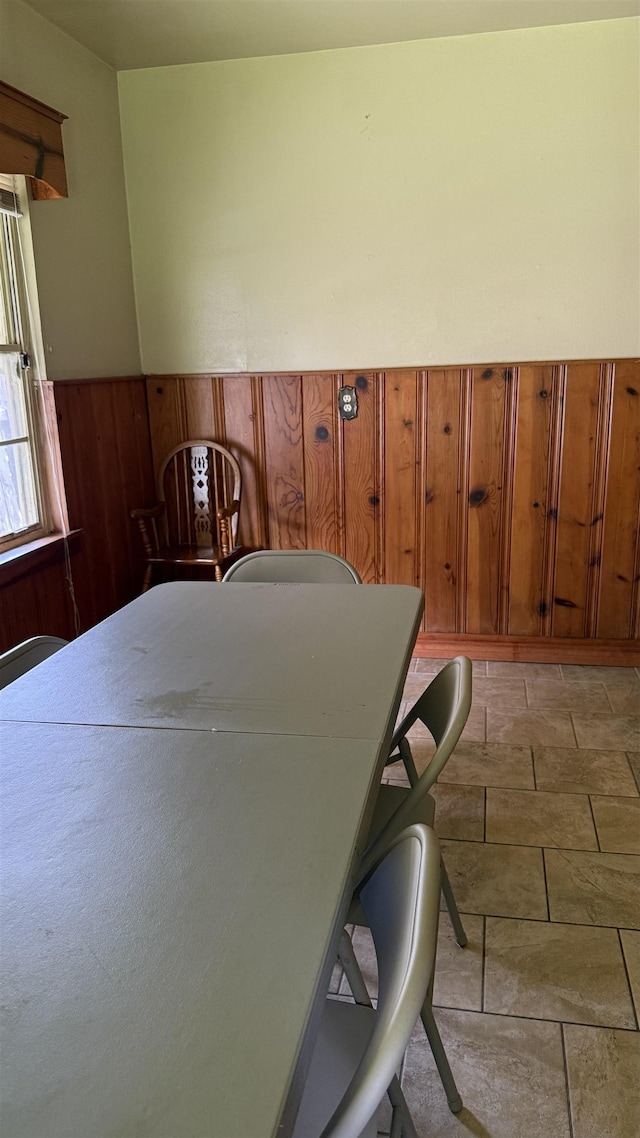 4011 Everglades Ave, Port Arthur, TX 77642 - dining room with wainscoting and wooden walls