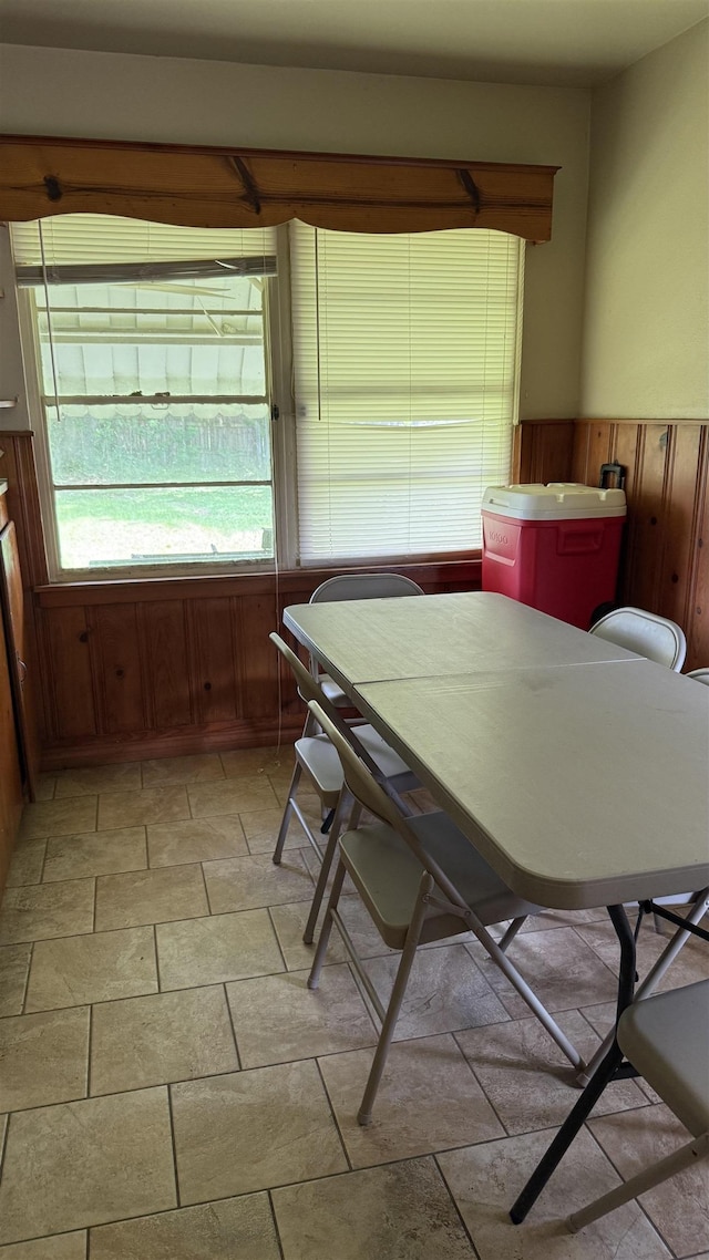 4011 Everglades Ave, Port Arthur, TX 77642 - dining room with wood walls and a wainscoted wall