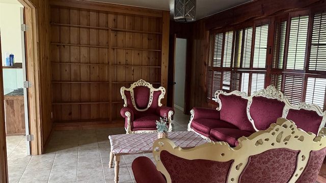 4011 Everglades Ave, Port Arthur, TX 77642 - living area with light tile patterned floors and wooden walls
