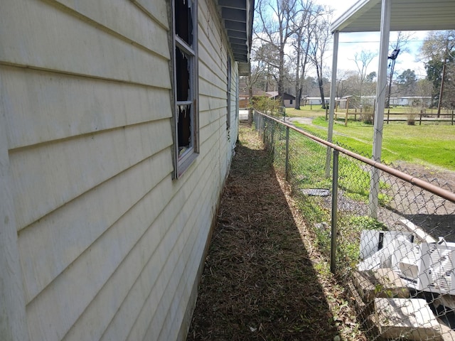 view of property exterior with fence