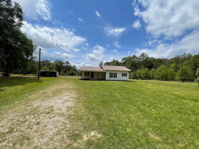 exterior space with a lawn and driveway