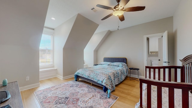 bedroom featuring ceiling fan and light hardwood / wood-style flooring