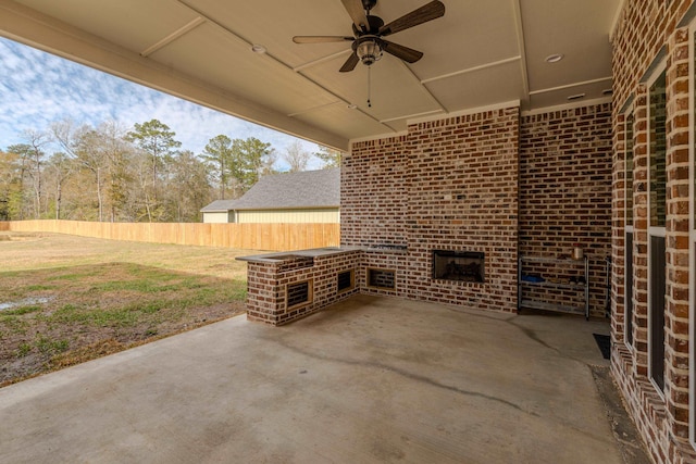 view of patio with ceiling fan