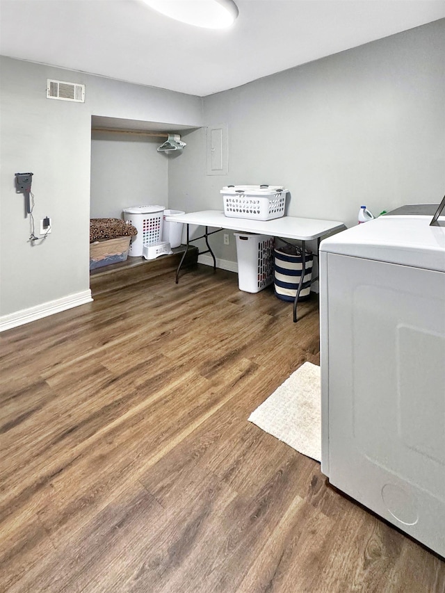 office with dark hardwood / wood-style flooring