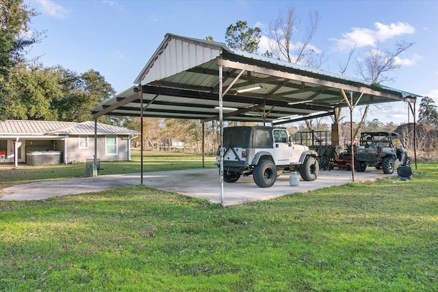 view of car parking featuring a carport and a lawn