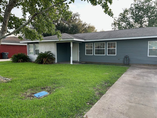 ranch-style house with a front yard