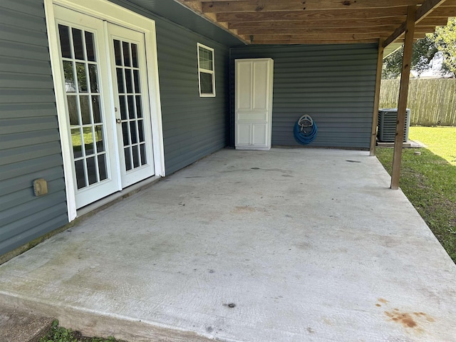 view of patio featuring french doors and central air condition unit