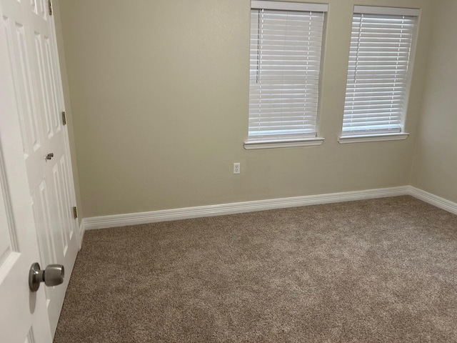 view of carpeted spare room