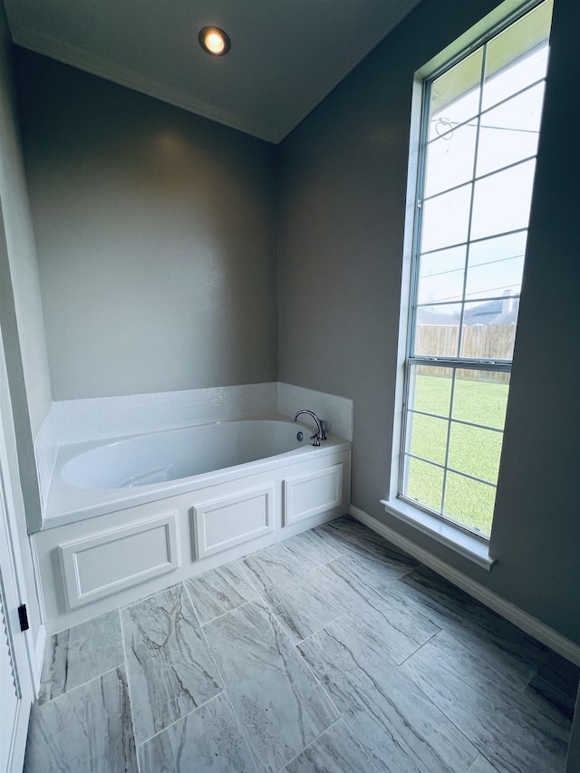 7060 Westgate Dr, Beaumont, TX 77706 - bathroom with a bath, baseboards, and recessed lighting