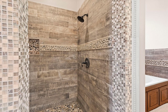 8395 Carrie Ln, Beaumont, TX 77713 - bathroom with tiled shower and vanity