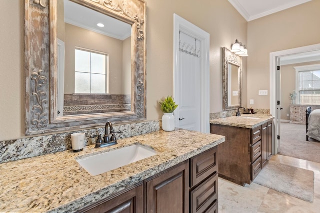 8395 Carrie Ln, Beaumont, TX 77713 - bathroom featuring ornamental molding, two vanities, and ensuite bathroom