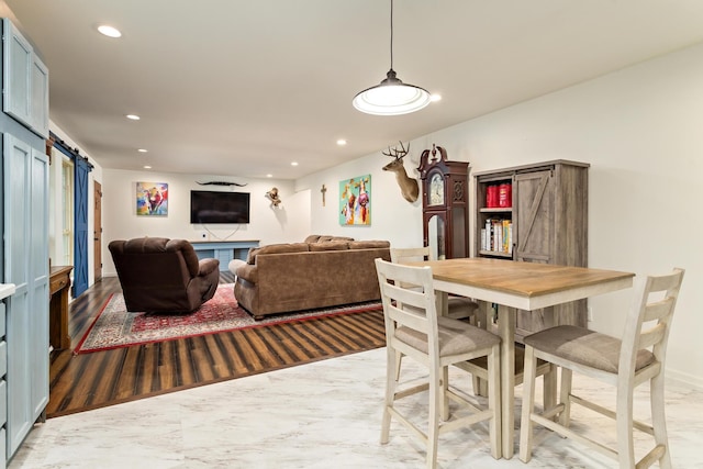 dining room featuring a barn door