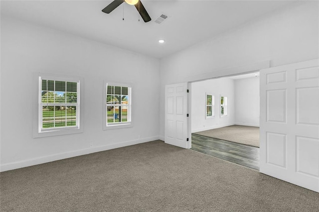 unfurnished bedroom with carpet and ceiling fan