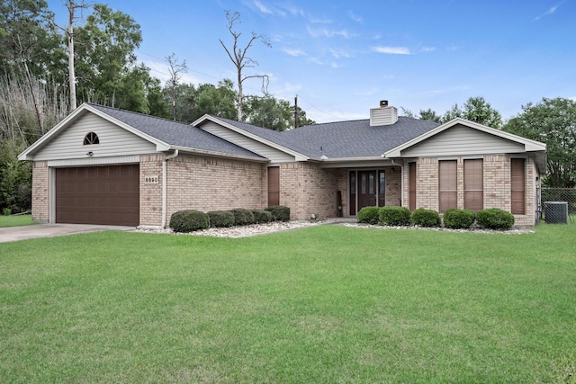 6690 Hackberry Dr, Beaumont, TX 77708 - ranch-style home with an attached garage, brick siding, a chimney, and a shingled roof