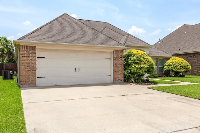 3665 Canyon Ln, Beaumont, TX 77713 - view of front of home with brick siding, concrete driveway, and a front yard