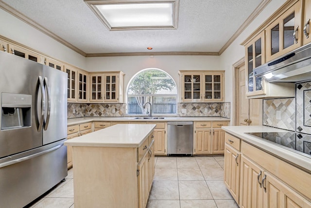 kitchen featuring tasteful backsplash, light tile patterned flooring, a kitchen island, and stainless steel appliances