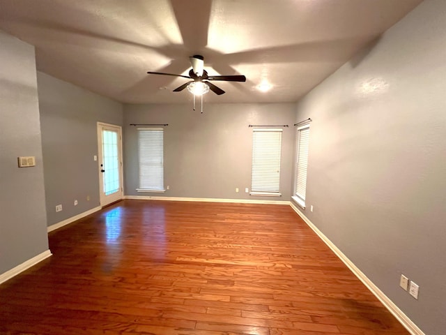 spare room featuring ceiling fan and wood-type flooring